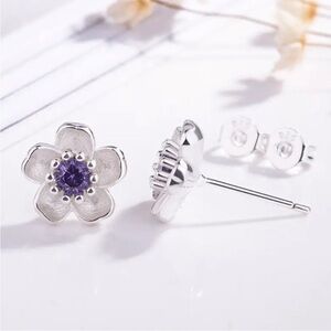 Elegant Silver Flower Earrings with Purple Gem